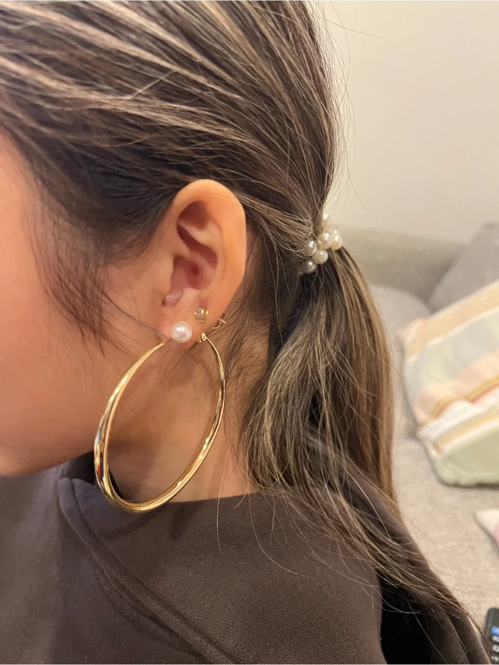 70mm gold-tone hoop earrings.